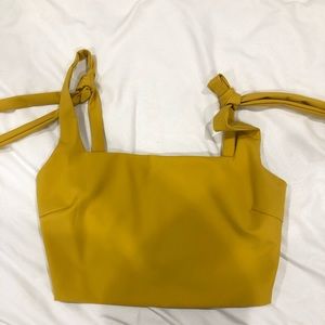 small yellow crop top